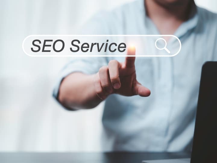 Man hand pointing and search for SEO service Rankpage Singapore