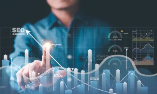 A finger pointing towards the fluctuating of graph indicating strategic overview SEO performance audit